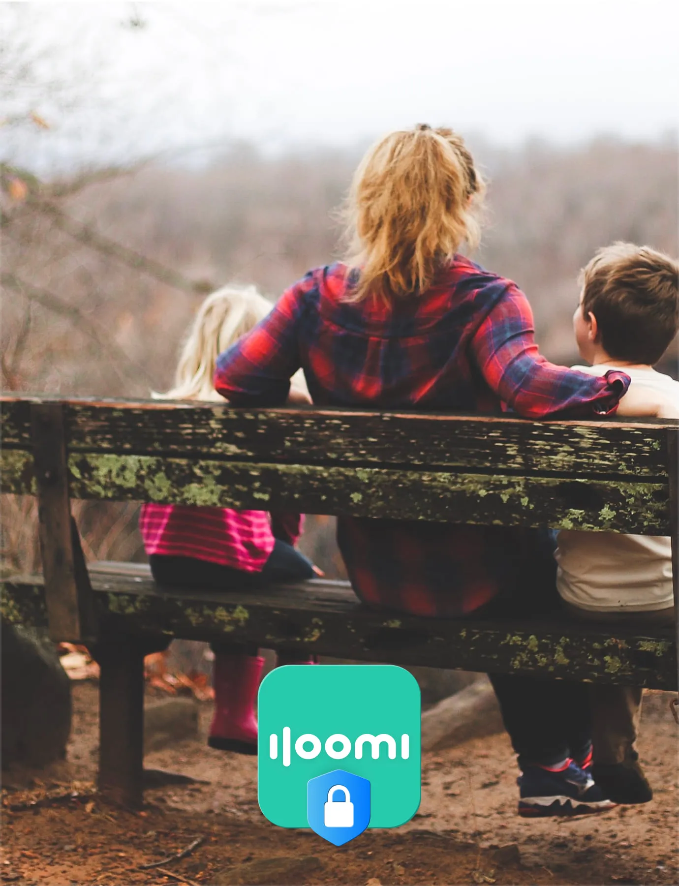 Family sitting together on a bench — Iloomi keeps your story safe
